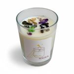 Velita ritualizada de la suerte con clavo y cardamomo para prosperidad, éxito y nuevas oportunidades.