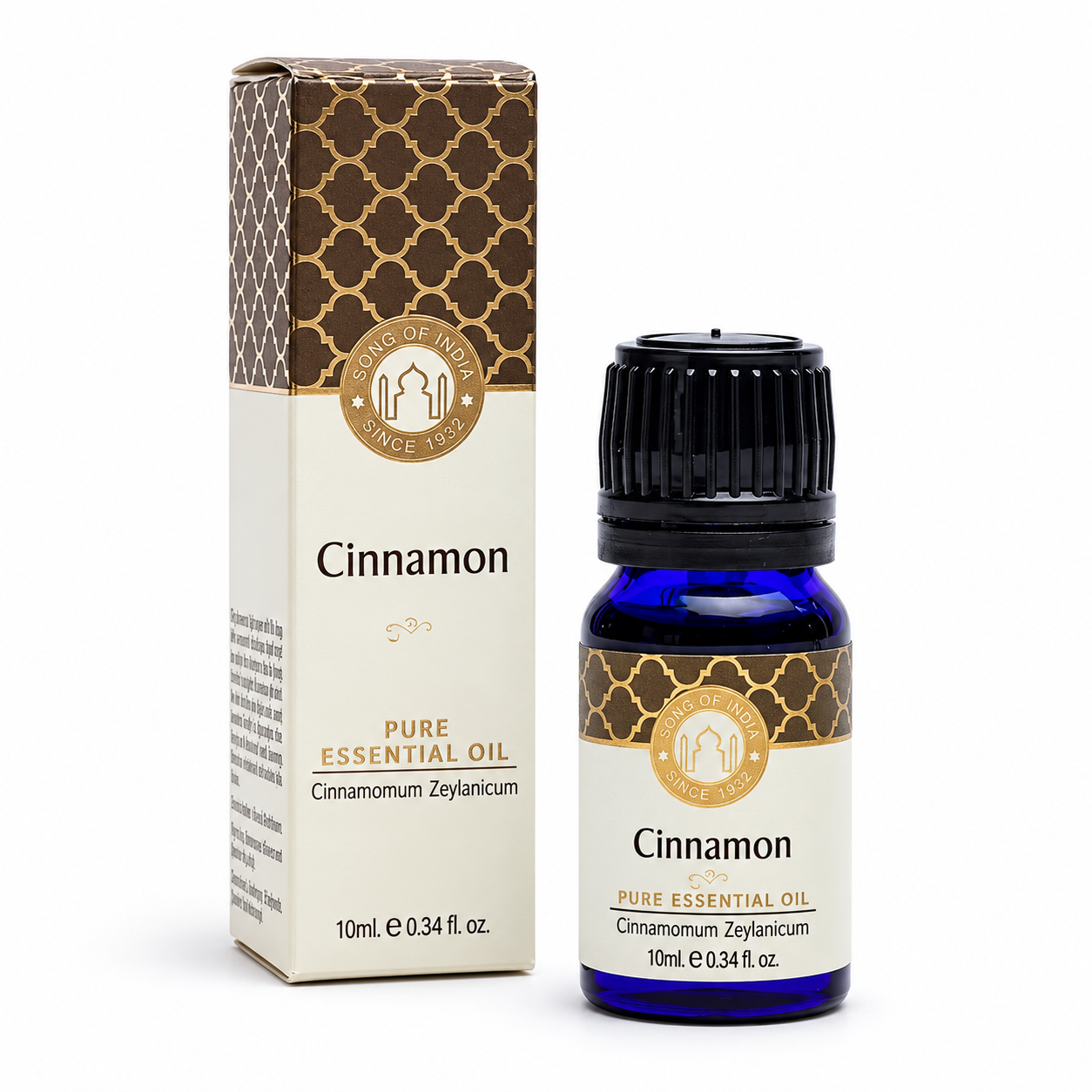 Aceite de canela para dinero — Aries y Escorpio Aceite esencial de canela con su caja y frasco de vidrio azul sobre fondo blanco